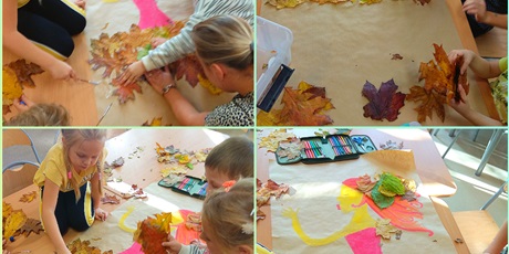Powiększ grafikę: Uczniowie w trakcie wykonywania prac plastycznych z liści.